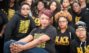 Alicia Garza and members of the #BlackLivesMatter movement for racial justice. Photograph: Kristin Little Photography
